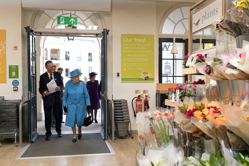 Queen Elizabeth II arrives to look around a Waitrose supermarket during a visit to the town of Poundbury on October 27, 2016 in Poundbury, Dorset. Photo via Getty Images.